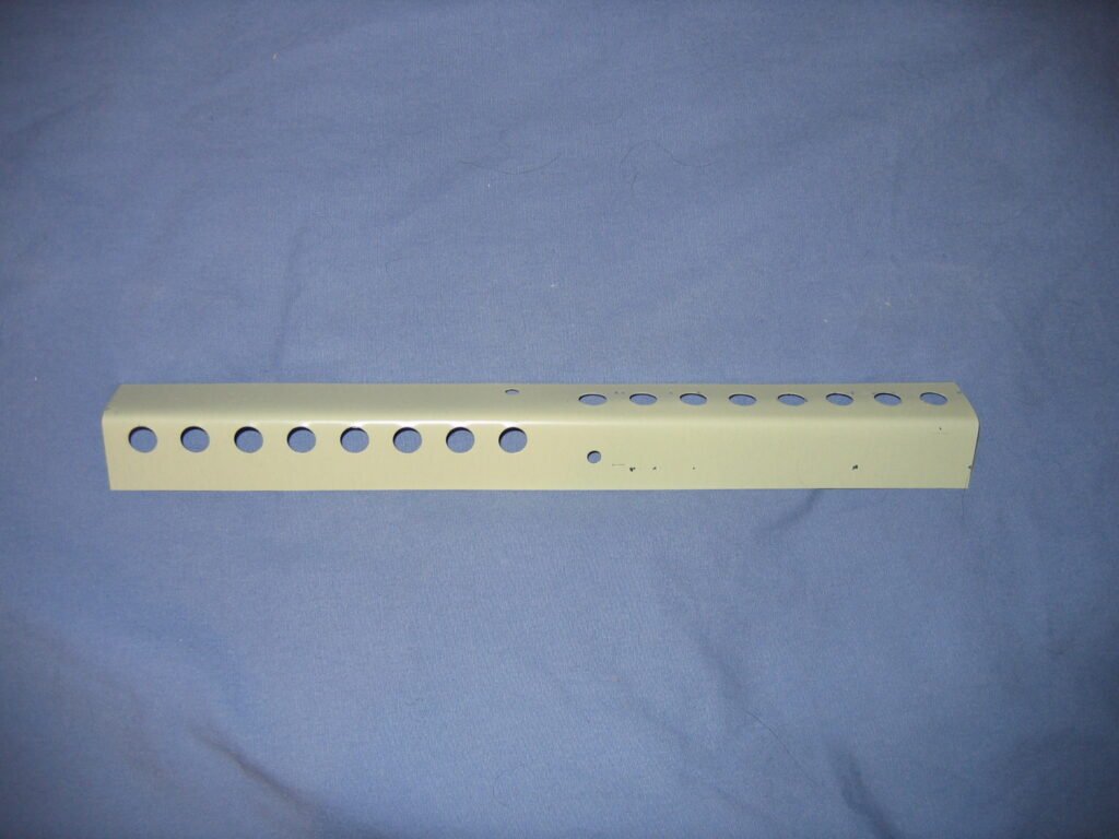 Metal mouse guard fitted to a beehive entrance
