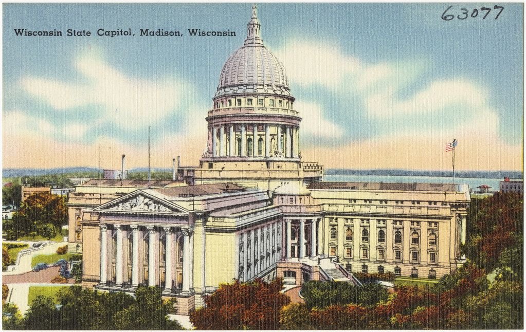 Vintage postcard illustration of the Wisconsin State Capitol building with its large central dome in Madison