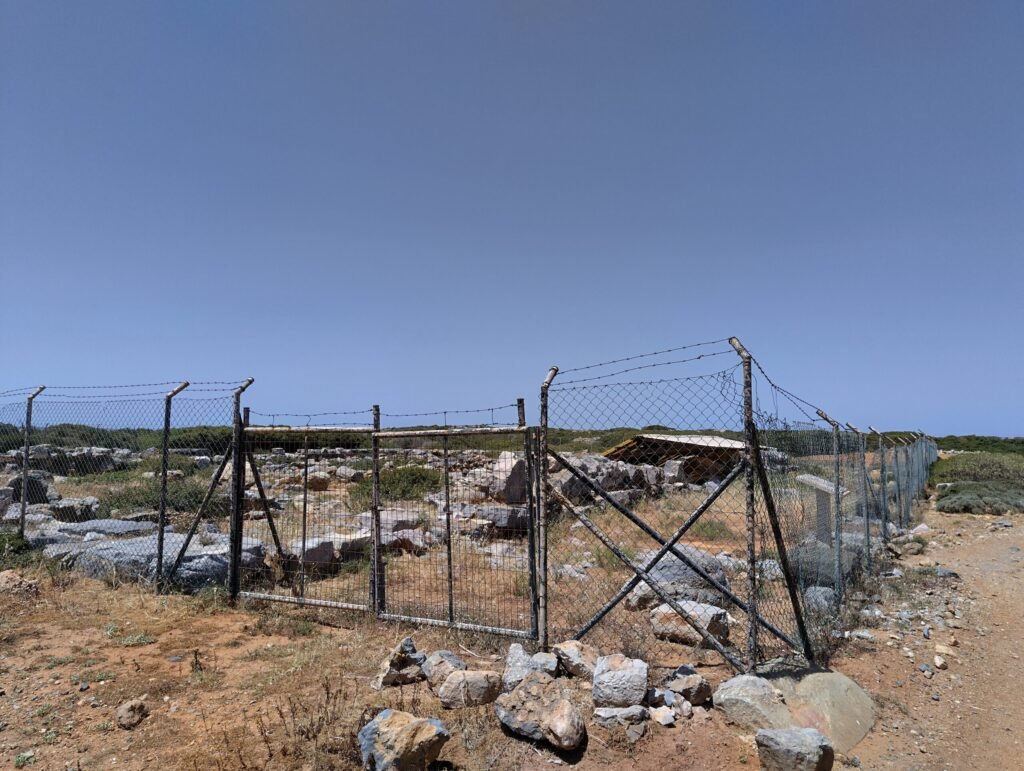 Ruins of the Chrysolakkos funerary complex near Malia, Crete, where the pendant was excavated in 1930