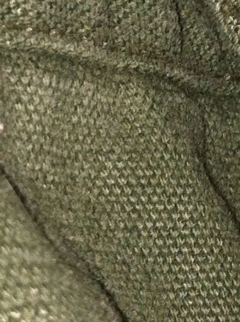 Close-up of the tight cotton duck canvas weave that beeswax is worked into for waterproofing