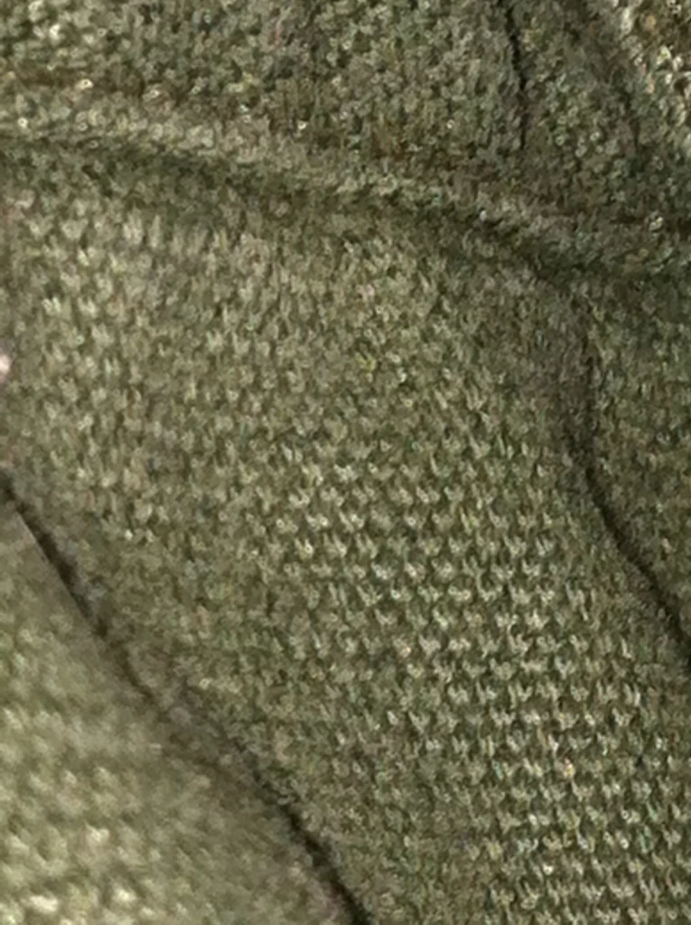 Close-up of the tight cotton duck canvas weave that beeswax is worked into for waterproofing