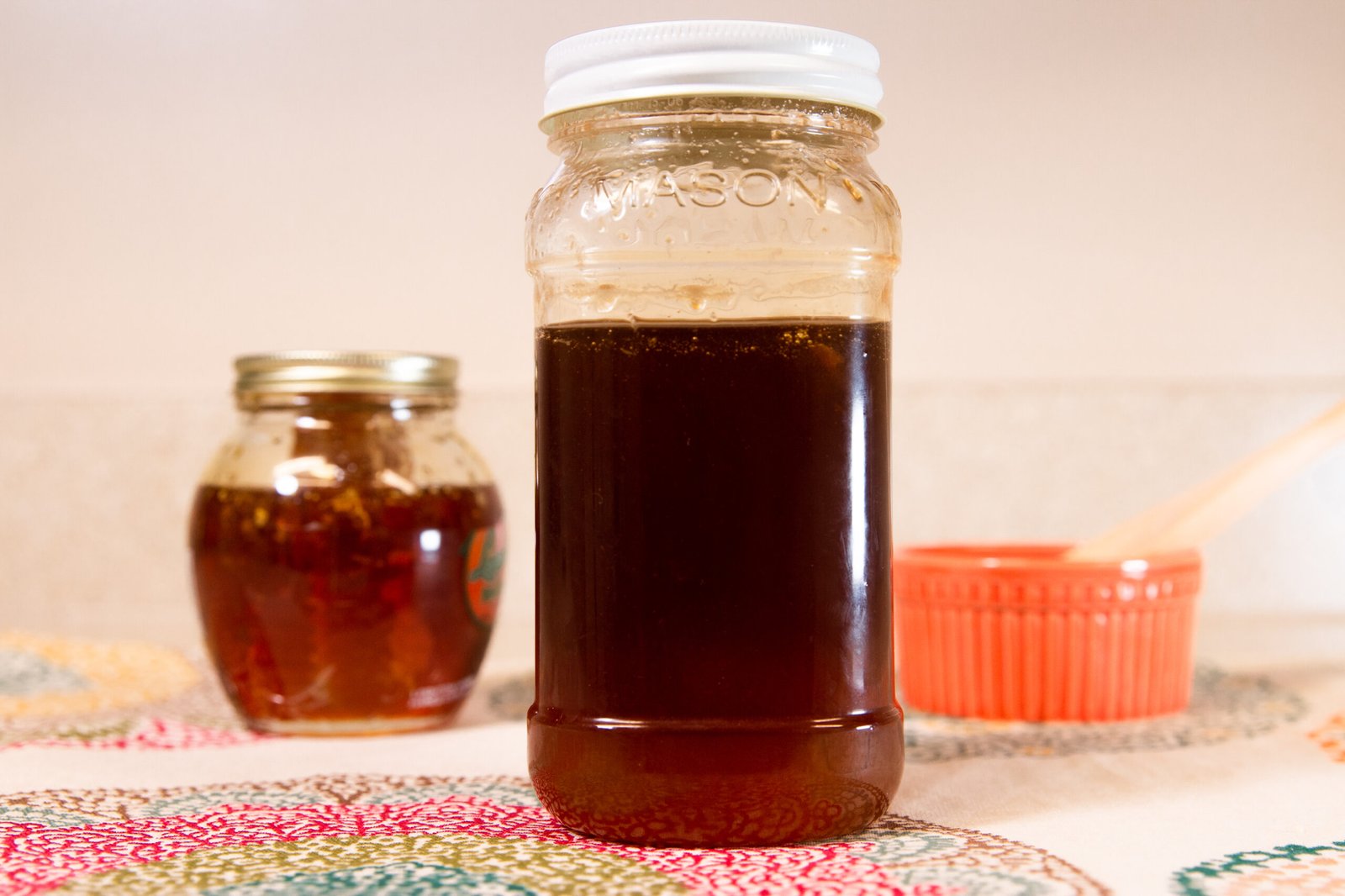 Jars of bottled honey ready for sale, the kind of small beekeeping side business where the LLC vs sole proprietorship decision comes up