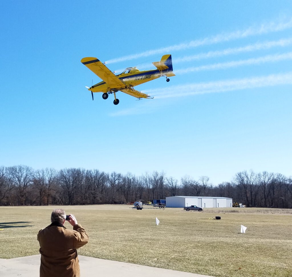 Agricultural spray plane used in aerial pesticide application training, the kind of applicator DriftWatch is built to inform