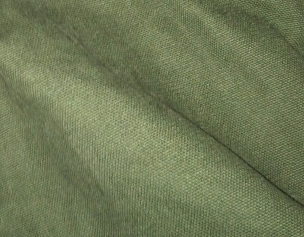 A close-up of cotton duck canvas, the tightly-woven natural fabric traditionally waxed with beeswax for waterproofing
