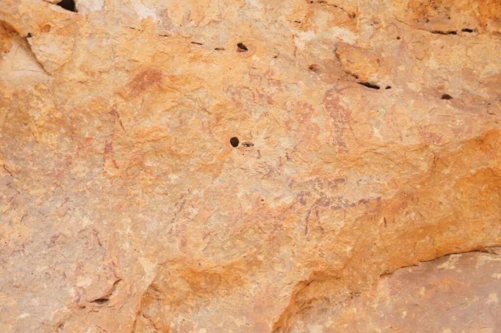 Photograph of the Cuevas de la Arana rock shelter site near Bicorp, Spain, home of the honey-hunting rock art