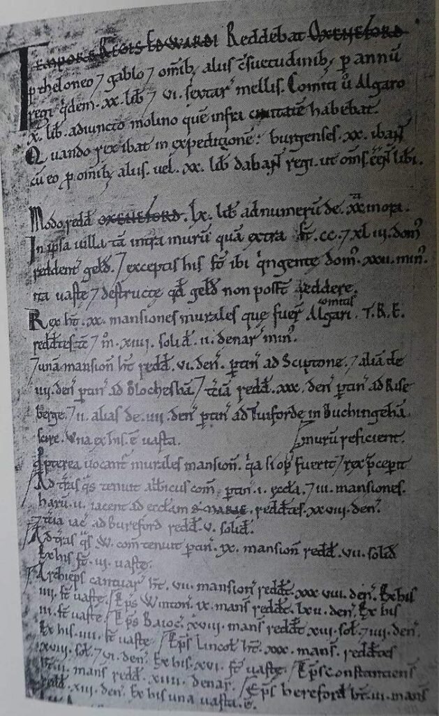 Handwritten Latin manuscript page from the 1086 Domesday Book survey