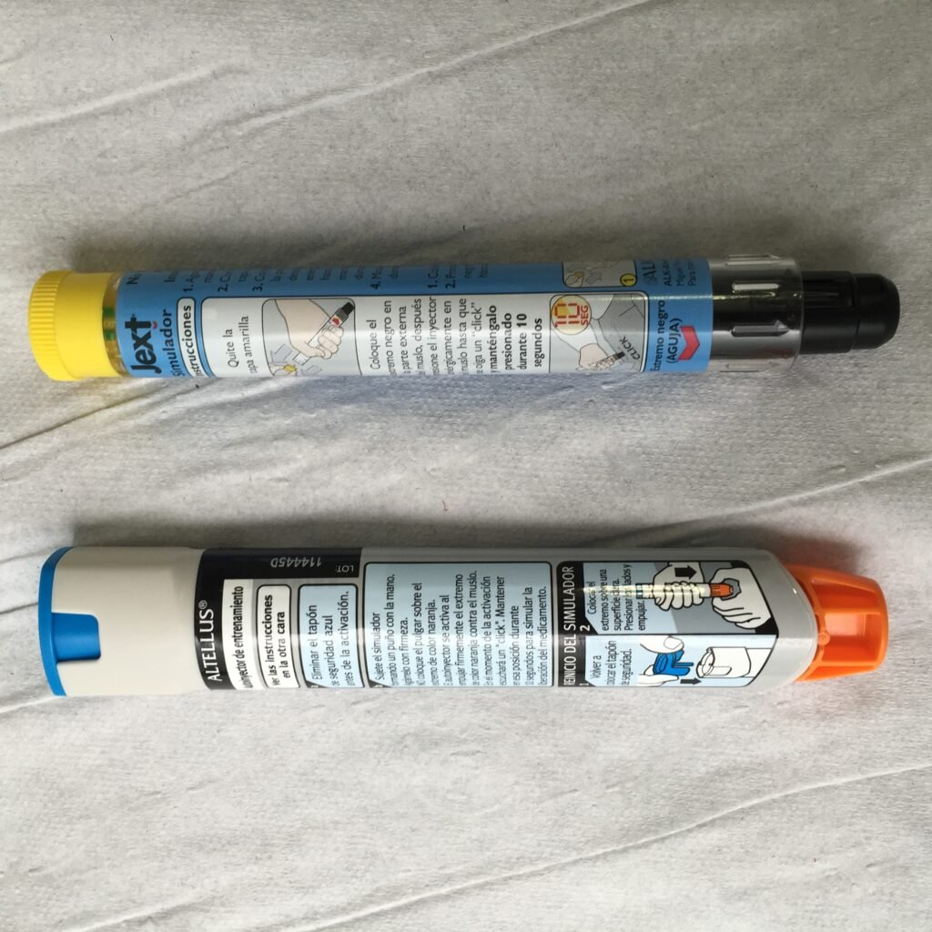 Epinephrine auto-injector devices of the type prescribed for severe bee sting allergic reactions