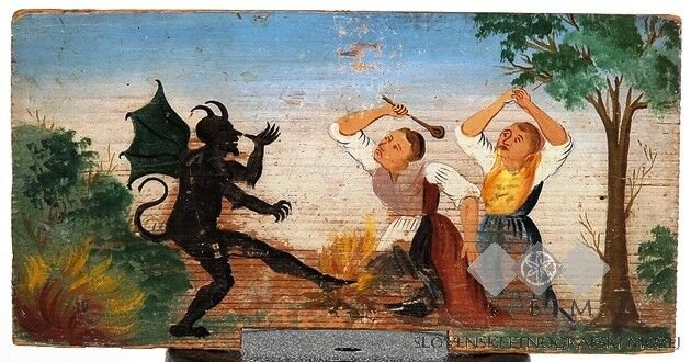 Satirical painted Slovenian beehive panel showing women driving away the devil, by Gregor Benedik