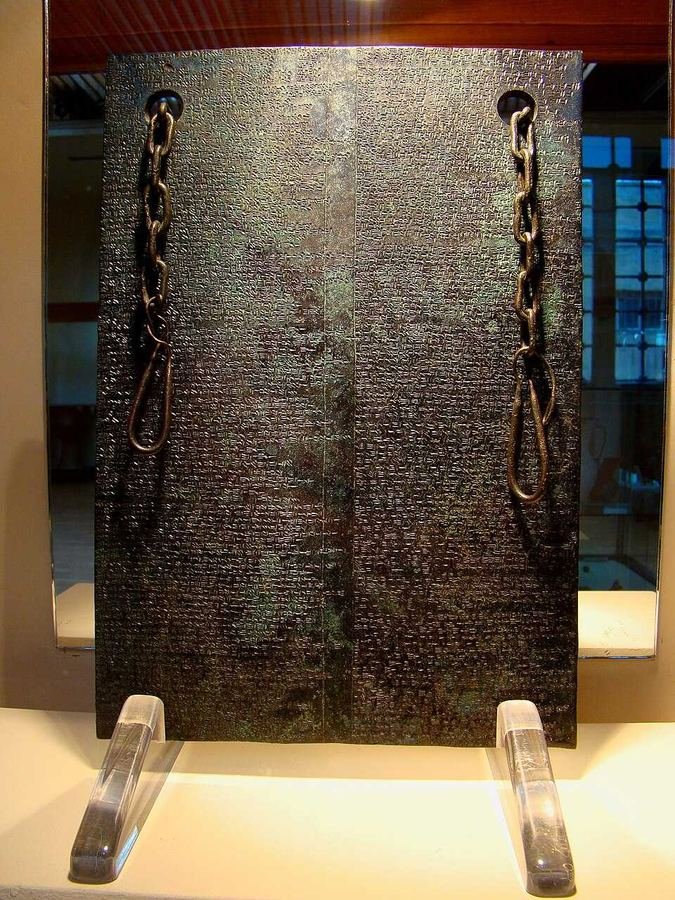 Bronze Hittite cuneiform tablet from Hattusa displayed in a museum case