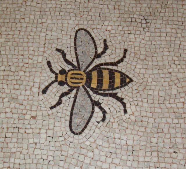 Mosaic of Manchester's worker bee symbol set into the Town Hall floor