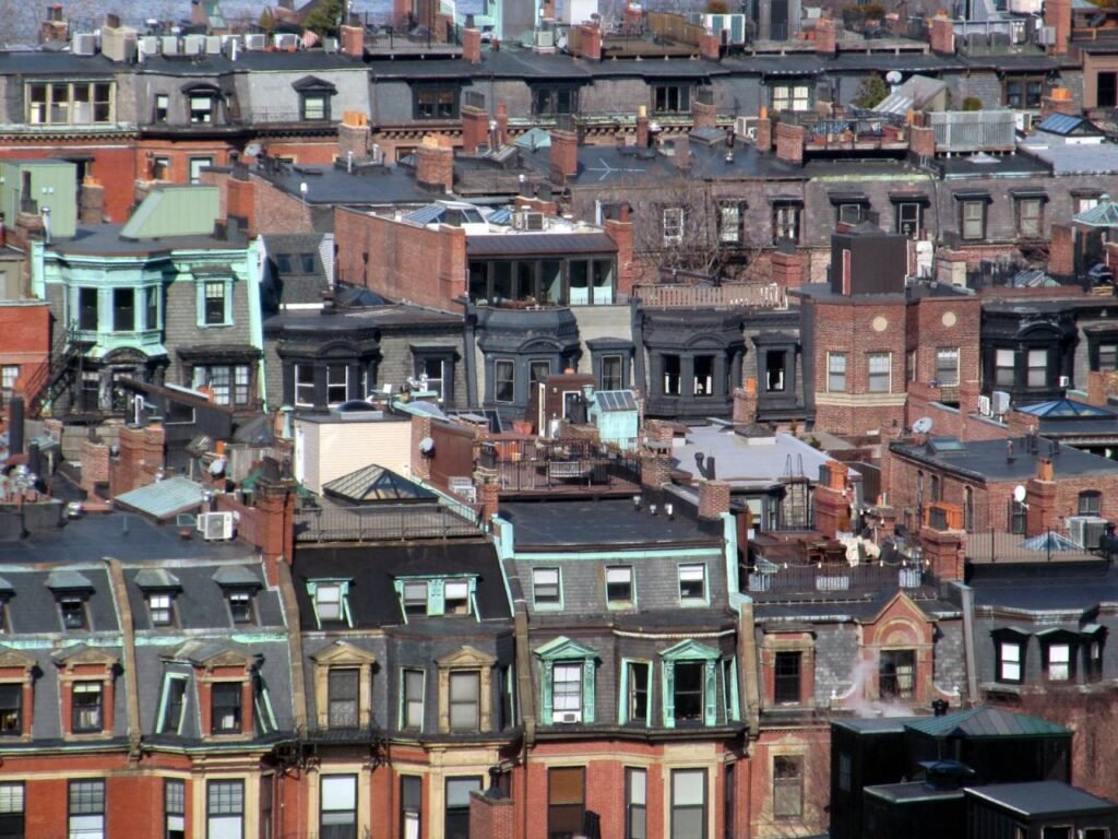 A dense residential neighborhood of brownstones, the kind of setting where local zoning bylaws govern beekeeping outside Boston