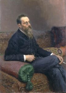 1893 oil painting portrait of composer Nikolai Rimsky-Korsakov seated on a couch