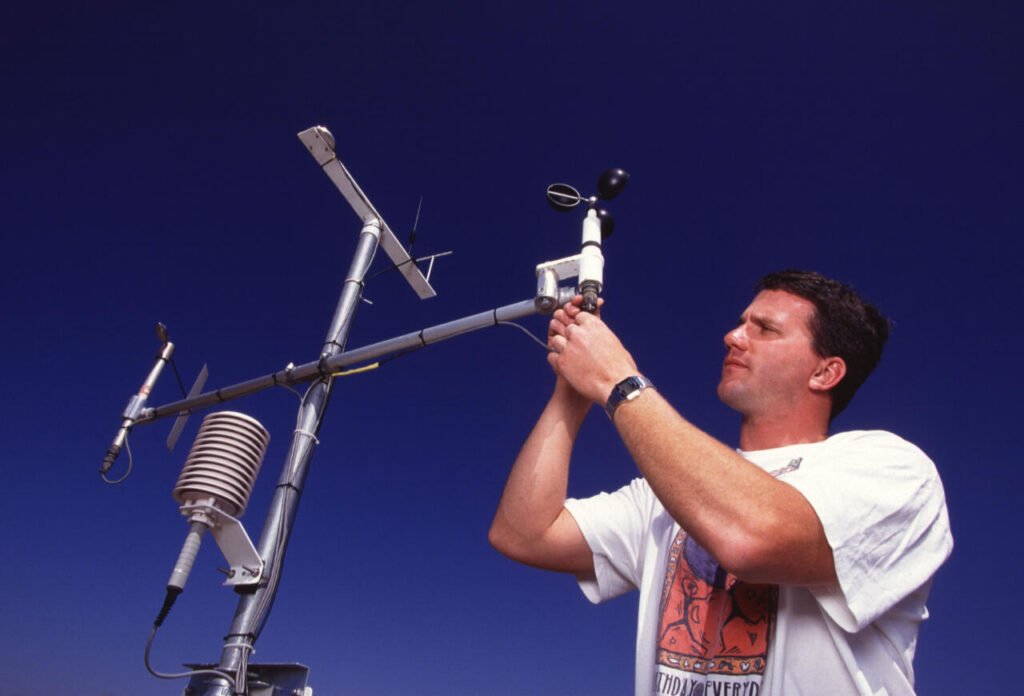 USDA agricultural research weather station gathering rainfall, temperature, and wind speed data in the field