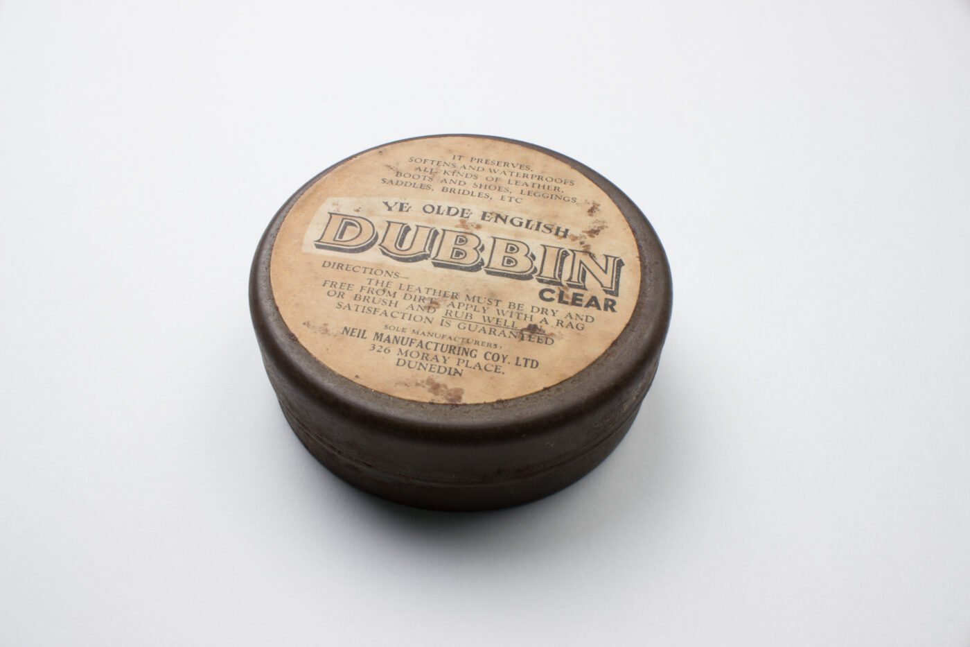 Vintage circular tin of Dubbin clear wax leather dressing for boots and saddles