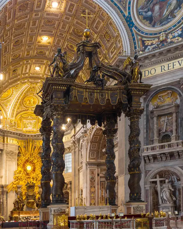 Bernini's twisted bronze columns and canopy over the high altar of St. Peter's Basilica, seen from the nave